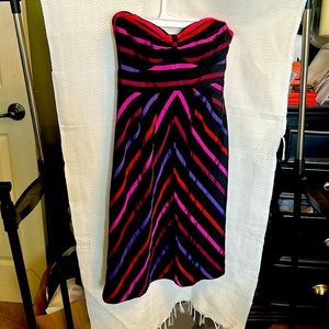 Guess Strapless cocktail Dress with Chevron Pattern.